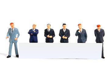 Image showing business people with banner