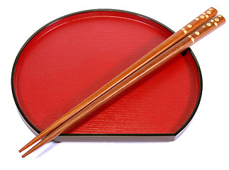 Image showing Chopsticks and plate