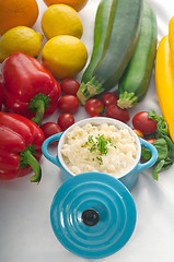 Image showing mac and cheese on a blue little clay pot