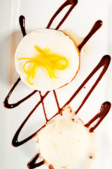 Image showing  lemon mousse served whith lemon peel on top