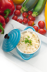 Image showing mac and cheese on a blue little clay pot