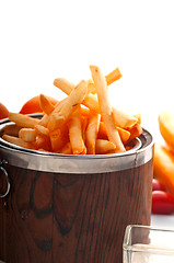 Image showing fresh french fries on a bucket