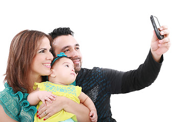 Image showing Closeup of happy family smiling over white background taking sel