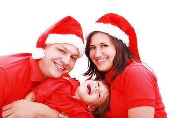 Image showing Happiness family in christmas hat isolated on white 