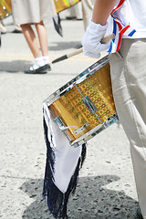 Image showing Drummer playing snare drums in parade, copy space, vertical 