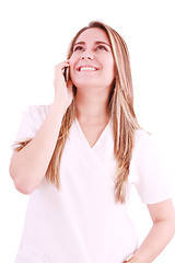 Image showing Medical professional talking on her mobile phone