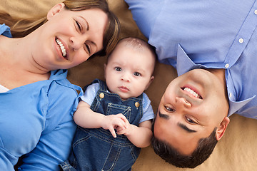 Image showing Mixed Race Family Playing on the Blanket