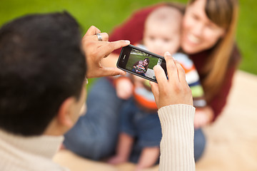 Image showing Happy Mixed Race Parents and Baby Boy Taking Self Portraits