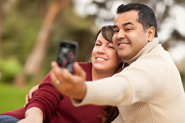 Image showing Attractive Mixed Race Couple Taking Self Portraits