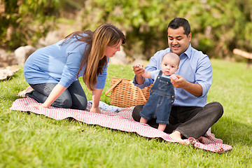 Image showing Happy Mixed Race Family Playing In The Park