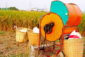 Image showing Vintage rice wood machine 