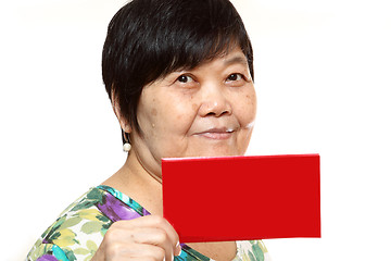 Image showing Asian woman holding a red card