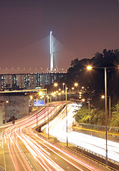 Image showing traffic through downtown at night 