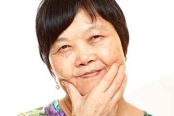 Image showing Senior Asian with hand