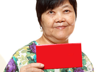 Image showing Asian woman holding a red card