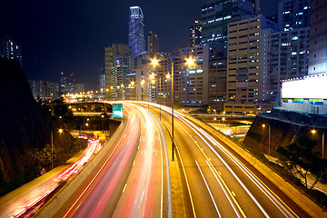 Image showing urban area dusk, busy traffic 