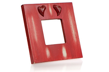 Image showing Red wooden picture frame with hearts