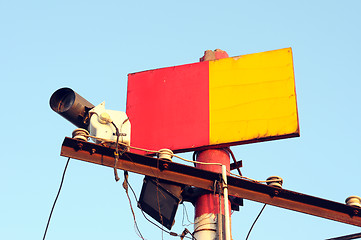 Image showing Red and yellow signs