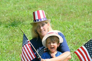 Image showing Young mother and son at 4th of July