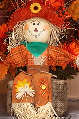 Image showing Halloween scarecrow sitting