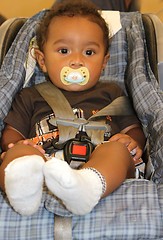 Image showing no captionAfrican american baby in carseat