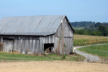 Image showing Old barn with winding country road