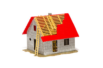 Image showing Plastic house model details on white background.