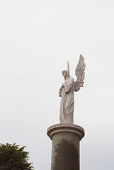 Image showing White angel with elevated wings 