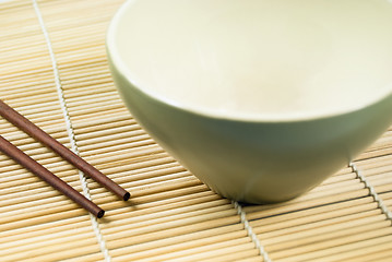 Image showing Chopsticks and Bowl