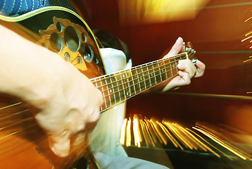 Image showing Guitar Player