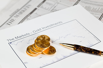 Image showing Golden Eagle coins on newspaper