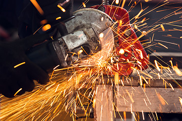 Image showing How to use a circular saw to make beautiful sparks