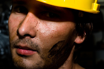 Image showing Tired industrial worker