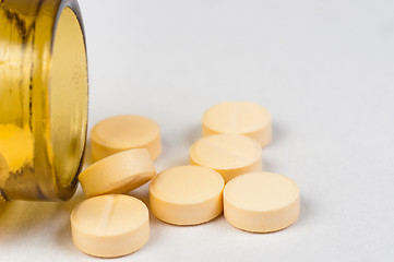 Image showing Pills and bottle on white isolated background