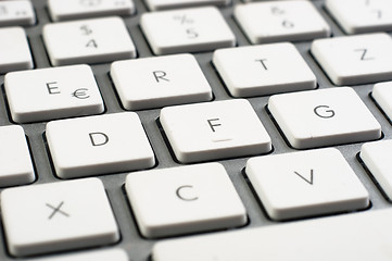 Image showing Closeup of a white clean keyboard