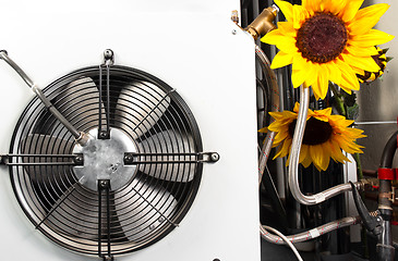 Image showing Clean ventilator with beautiful flowers