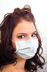 Image showing Closeup of a girl in medical mask