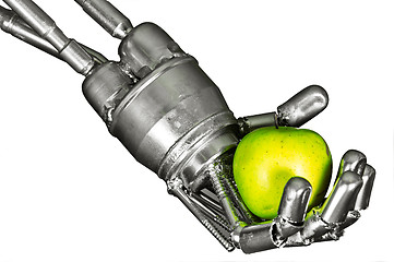Image showing Robot hand with green apple on isolated white background
