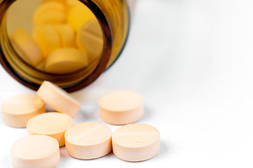 Image showing Pills and bottle on white isolated background