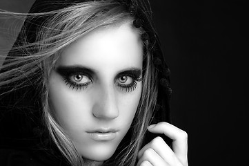 Image showing Black and white photo of a hooded girl