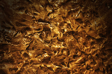 Image showing Bronze textured surface lit dramatically