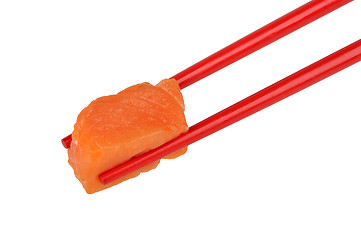 Image showing salmon in the red chopstick