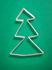 Image showing paper christmas tree on green background