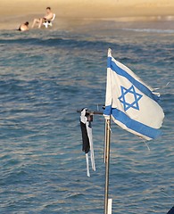 Image showing Israel state flag on a beach