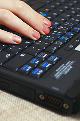 Image showing Fingers on the keyboard
