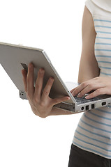 Image showing woman holding a laptop