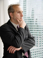 Image showing Businessman by the window