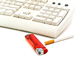 Image showing keyboard, cigarette and  lighter