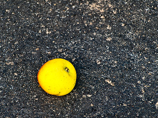 Image showing apple at asphalt
