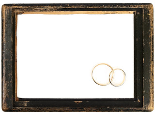 Image showing vintage wooden frame and wedding rings